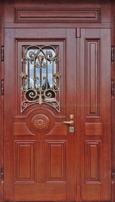 Филенчатая железная дверь со стеклом и ковкой ДСК-204 в Краснознаменске